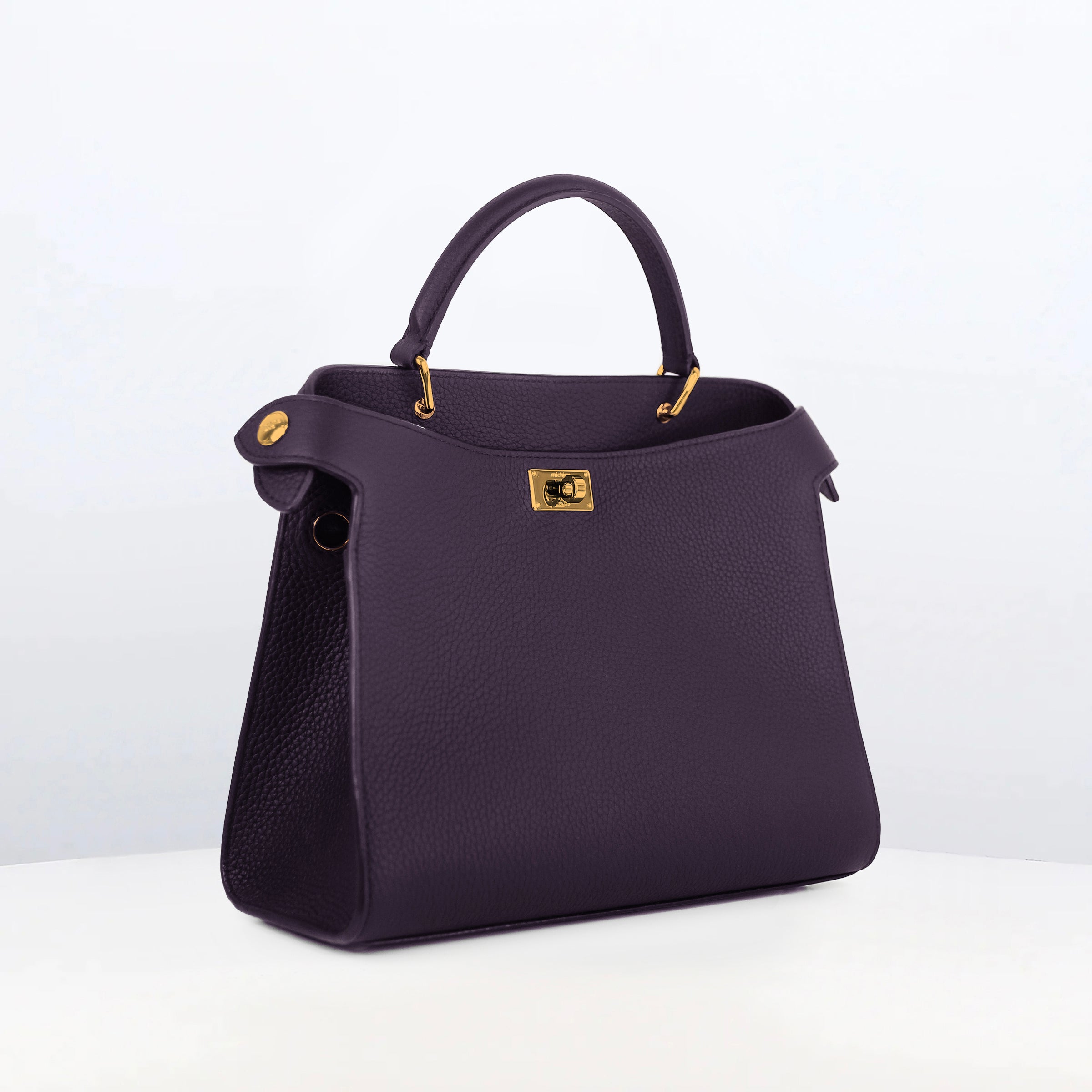 LEATHER HANDBAG LUTECE 27 RAISIN WITH GOLD HARWARE