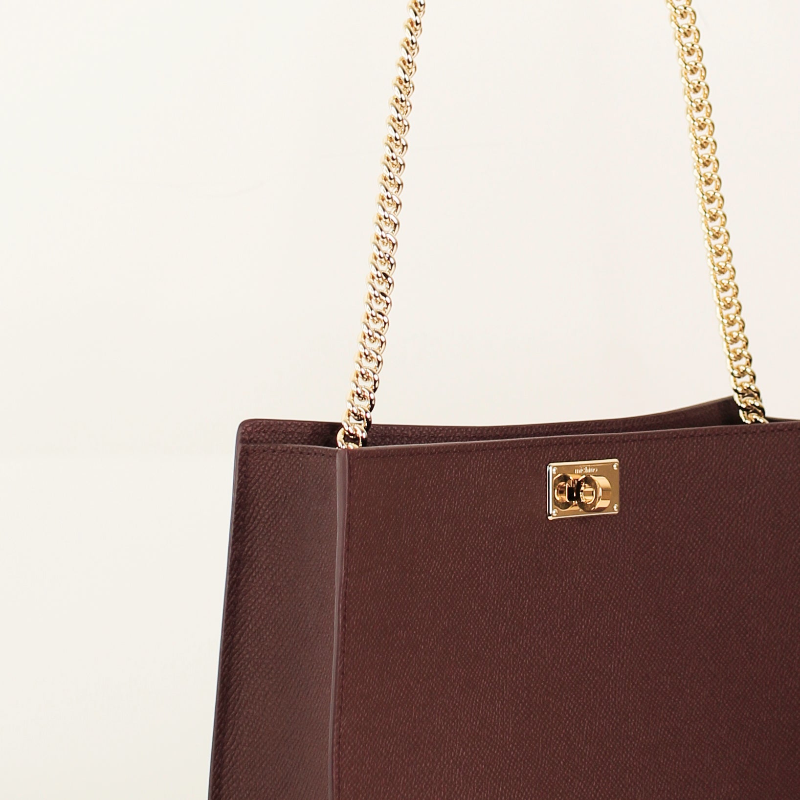 POCHETTE MONTAIGNE AUS LEDER PRUNE