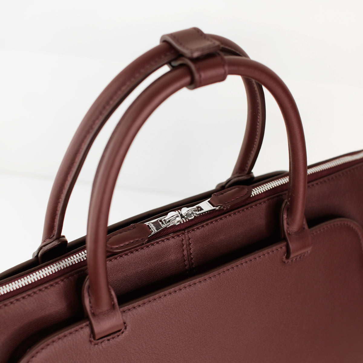 LEATHER HANDBAG SEPTIEME PM PRUNE