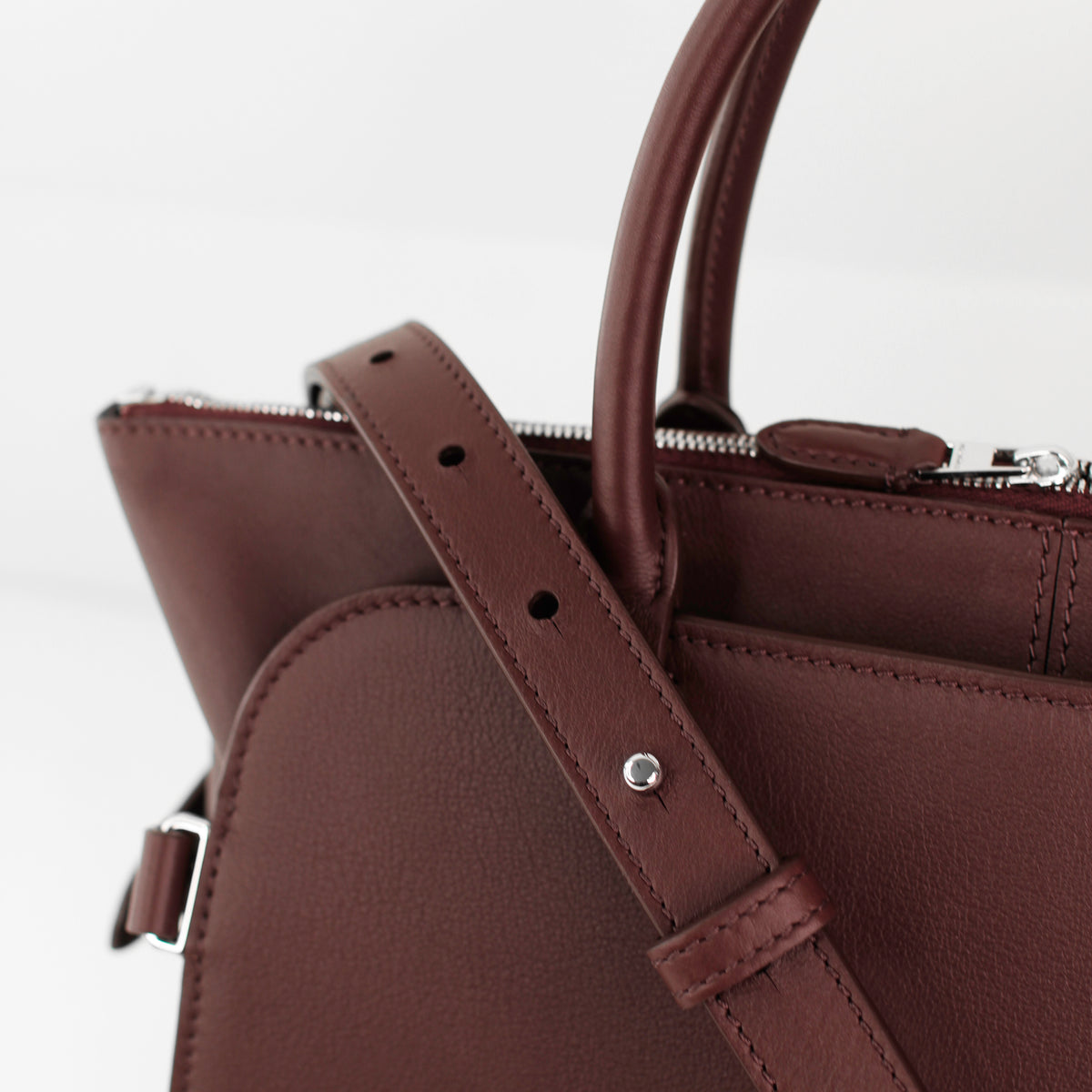 LEATHER HANDBAG SEPTIEME PM PRUNE