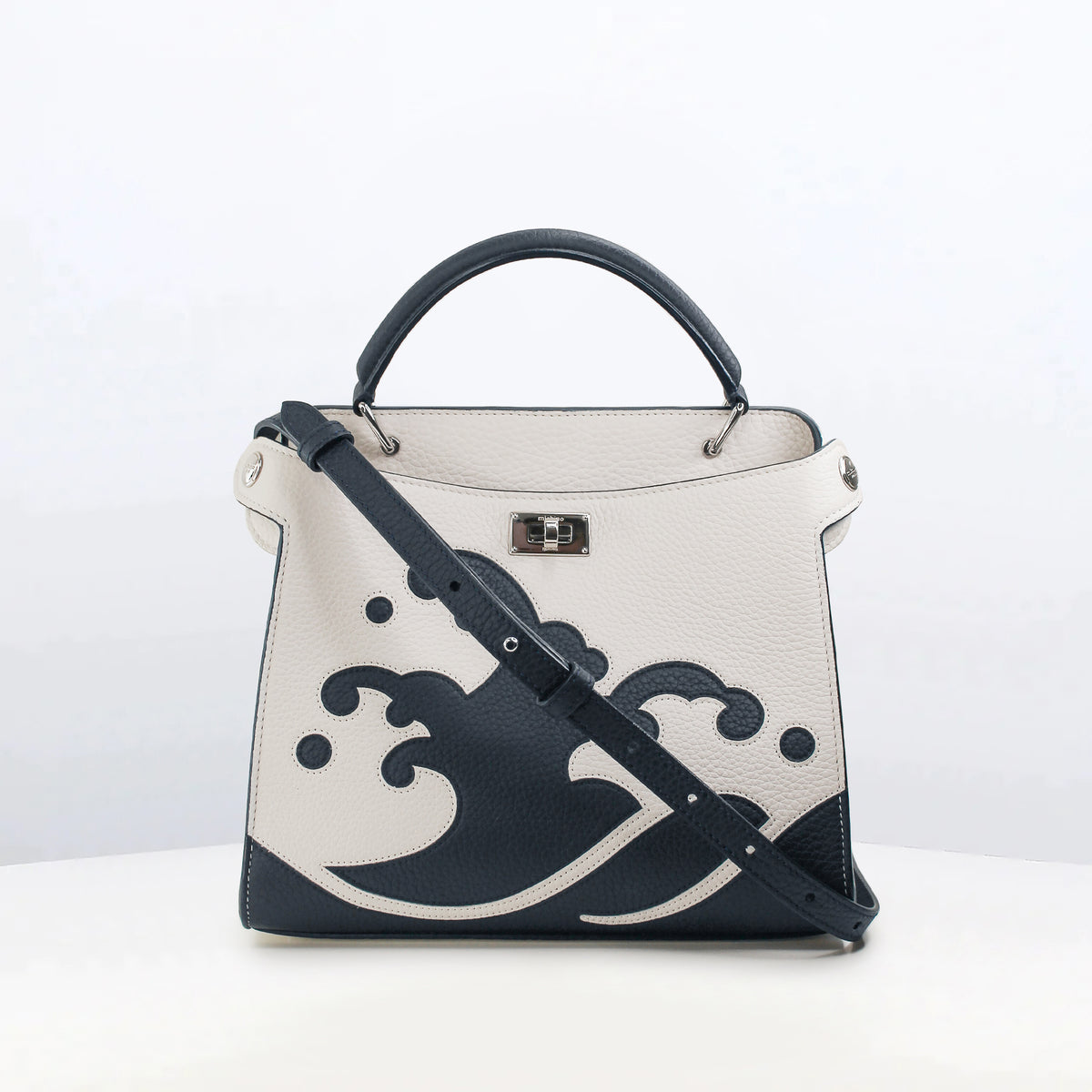 LEATHER HANDBAG LUTECE MINI WAVE