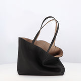 RIVOLI REVERSIBLE LEATHER TOTE BAG EAST/WEST BLACK/TOURTERELLE