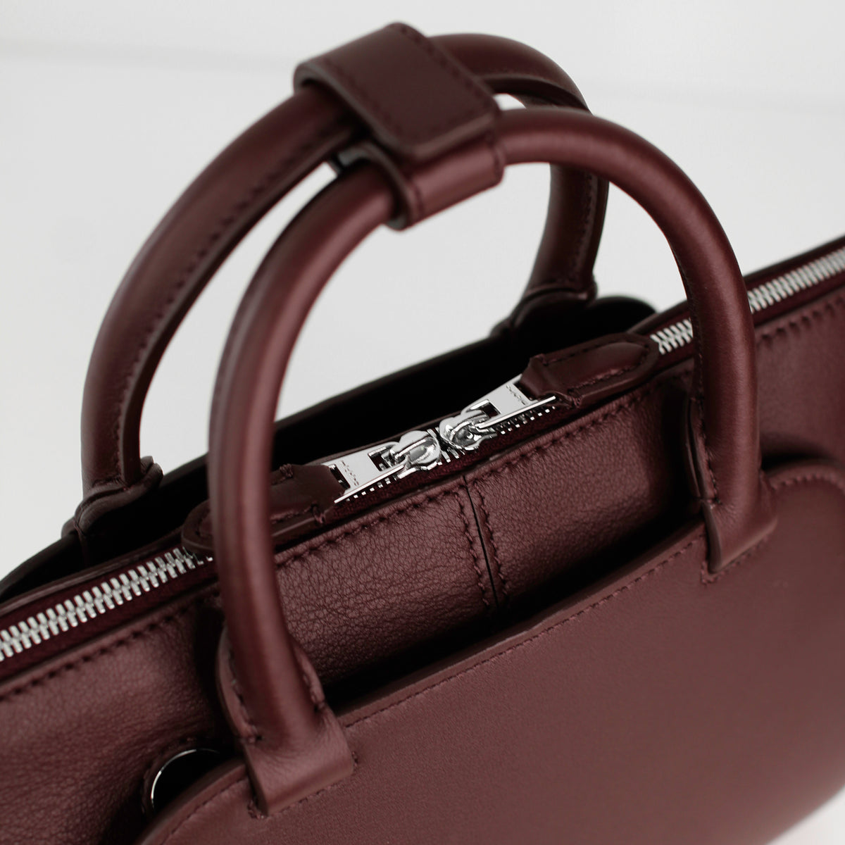 LEATHER HANDBAG SEPTIEME MINI PRUNE