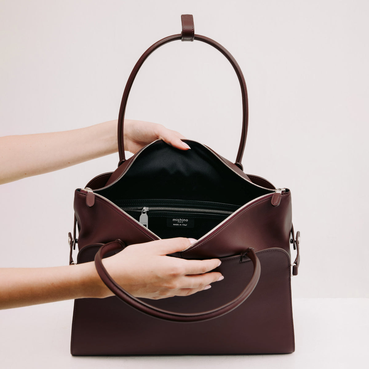 LEATHER HANDBAG SEPTIEME MM PRUNE